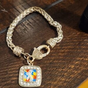 Intricate Stainless Steel Silver Bracelet with Puzzle Charm
